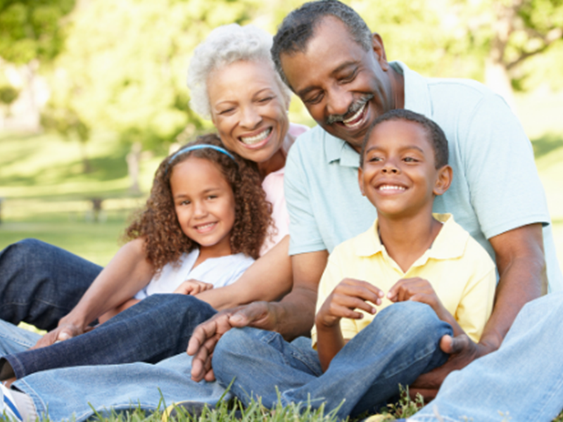 grandfamily sitting on lawn